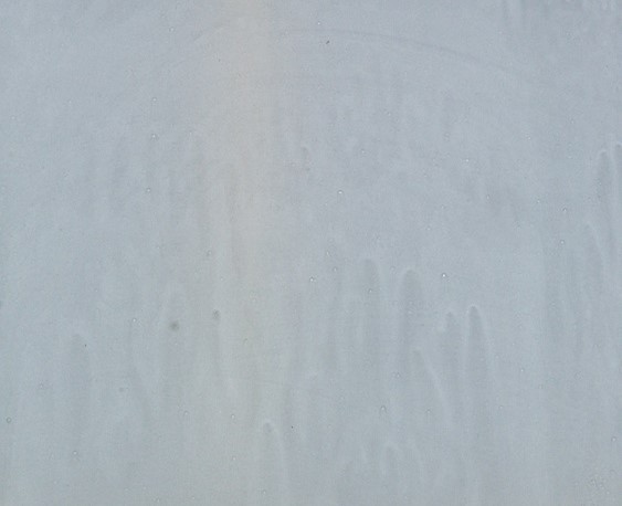 a close up of a white surface
